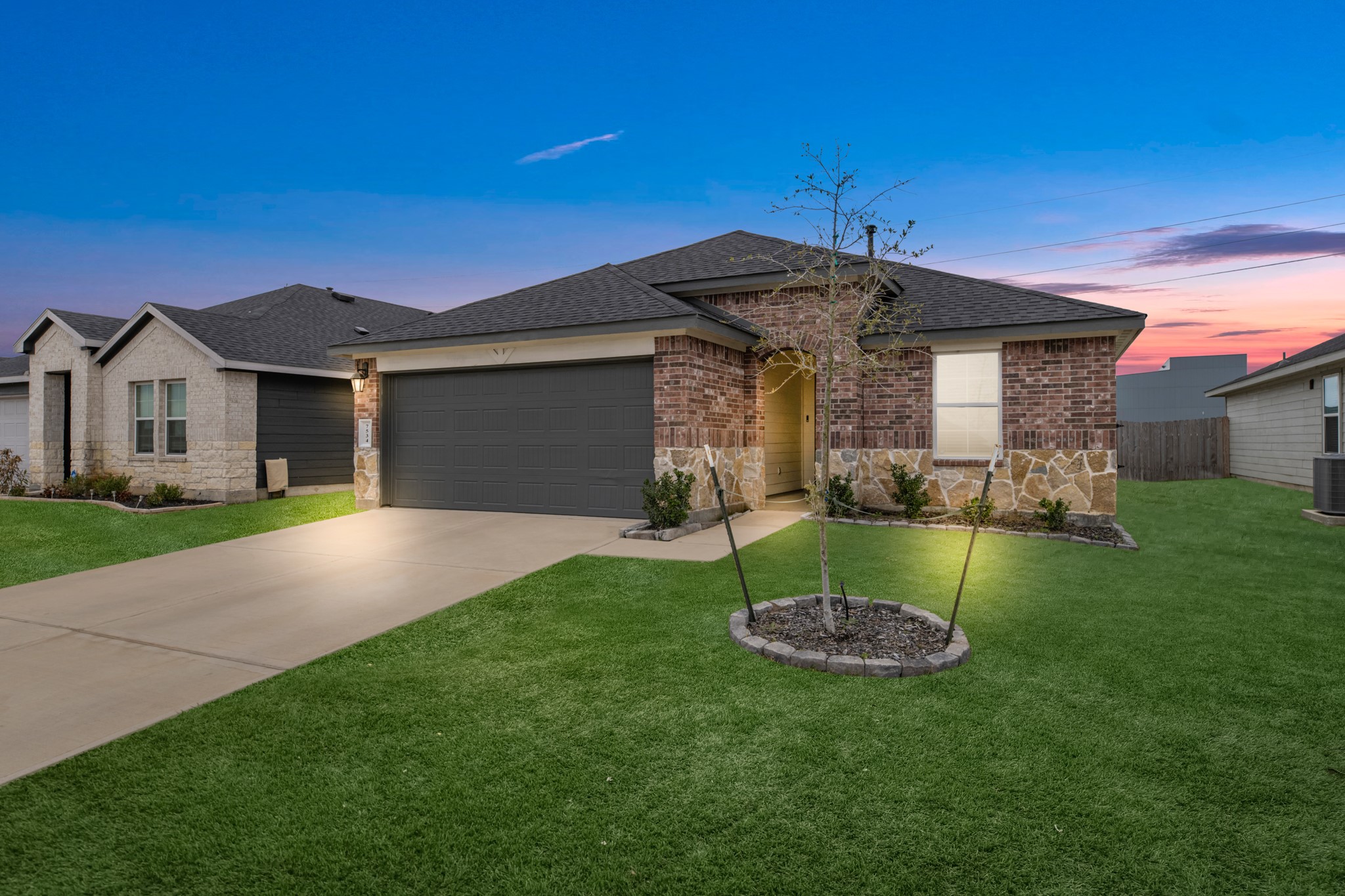 7534 Cynomys Court Rosharon, TX 77583 - Photo 1 of 35 a front view of a house with a yard