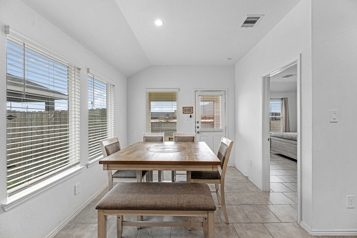 7534 Cynomys Court Rosharon, TX 77583 - Photo 14 of 35 a view of a dining room kitchen and a window