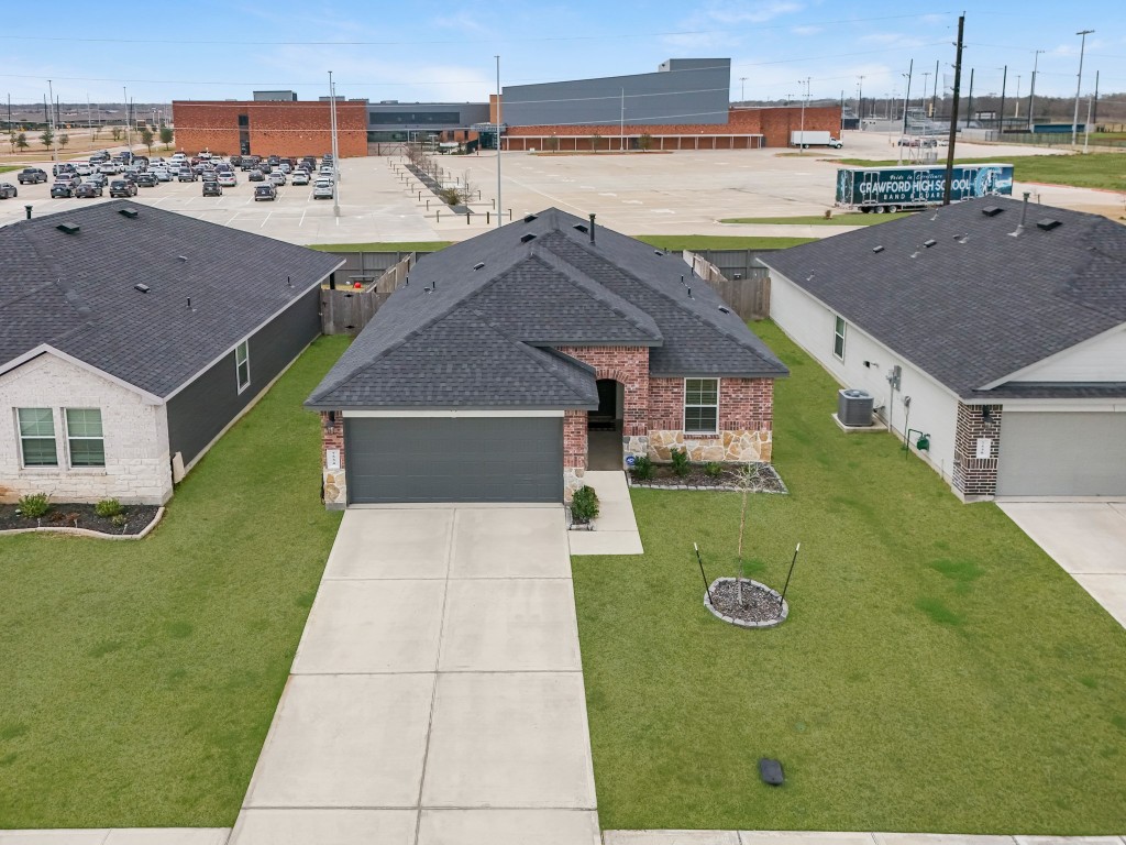 7534 Cynomys Court Rosharon, TX 77583 - Photo 2 of 35 a aerial view of a house with a yard