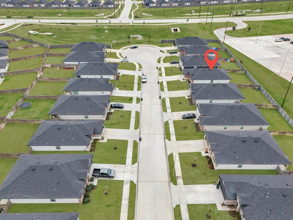 7534 Cynomys Court Rosharon, TX 77583 - Photo 31 of 35 a aerial view of a swimming pool