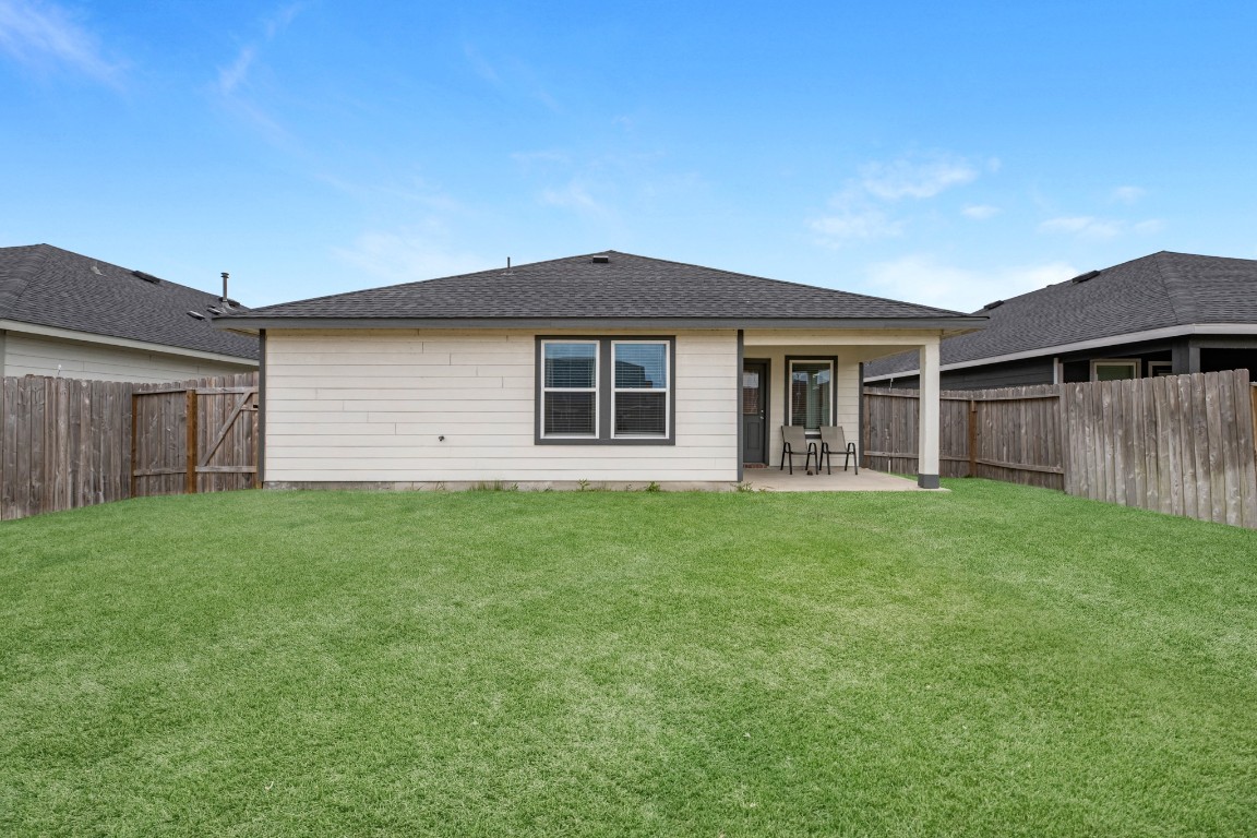 7534 Cynomys Court Rosharon, TX 77583 - Photo 35 of 35 a view of a house with a backyard