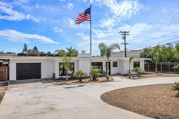 a view of a house with a park
