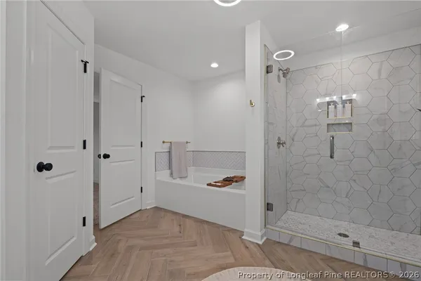 a bathroom with a shower and toilet