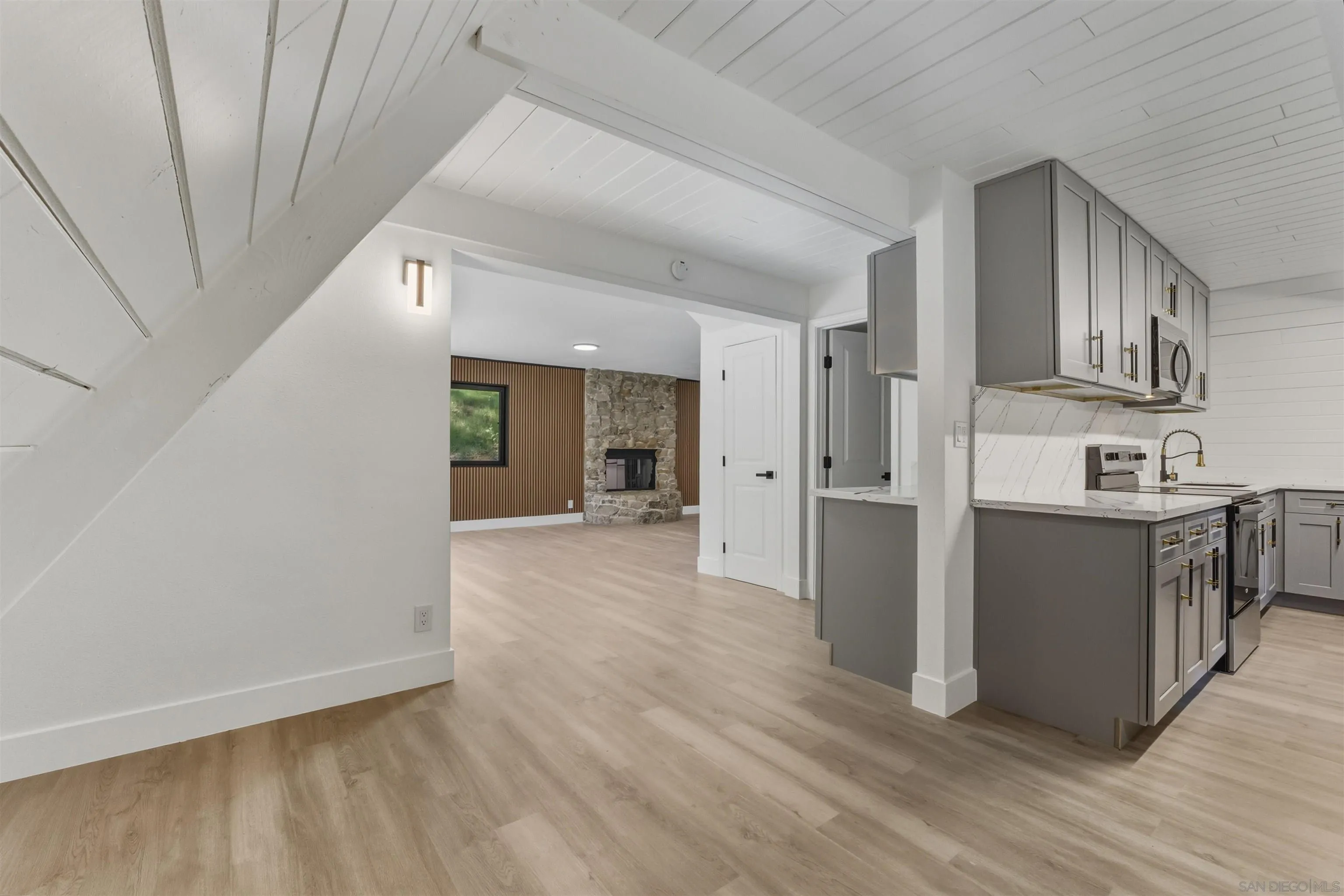 11618 Johnson Lake Road Lakeside, CA 92040 - Photo 3 of 25 a view of a kitchen cabinets and wooden floor
