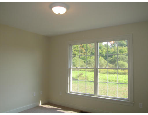 15 Macomber Road Monson, MA 01057 - Photo 14 of 16 a view of an empty room with a window