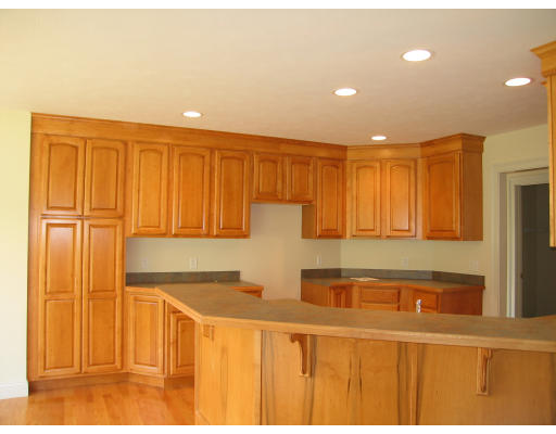15 Macomber Road Monson, MA 01057 - Photo 9 of 16 a kitchen with stainless steel appliances granite countertop a sink and cabinets