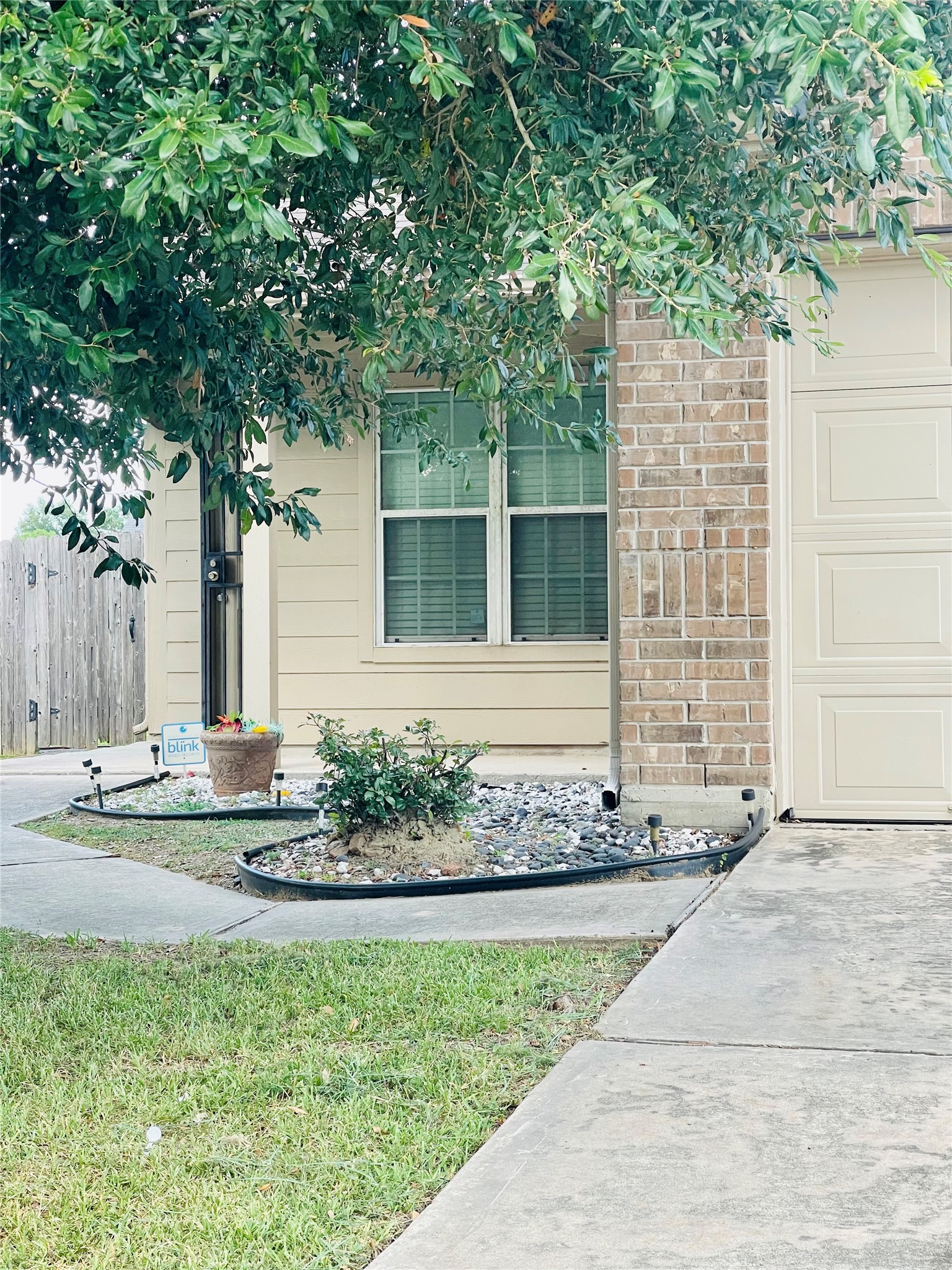 722 Pequin Road Crosby, TX 77532 - Photo 3 of 12 a front view of a house with a garden and plants