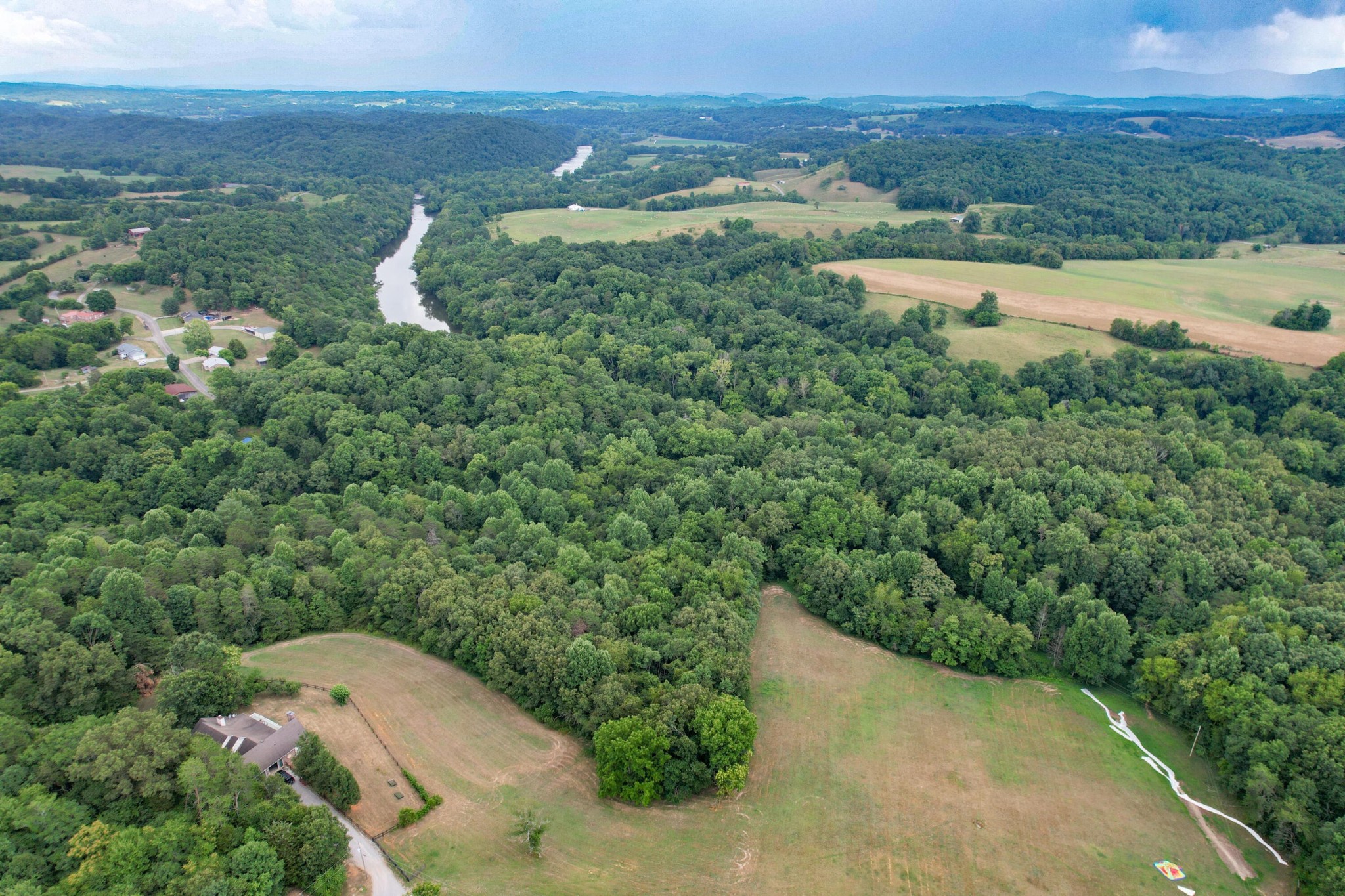 1 Pates Hill Road Mosheim, TN 37818 - Photo 12 of 22 a view of a lake with a yard and mountain view