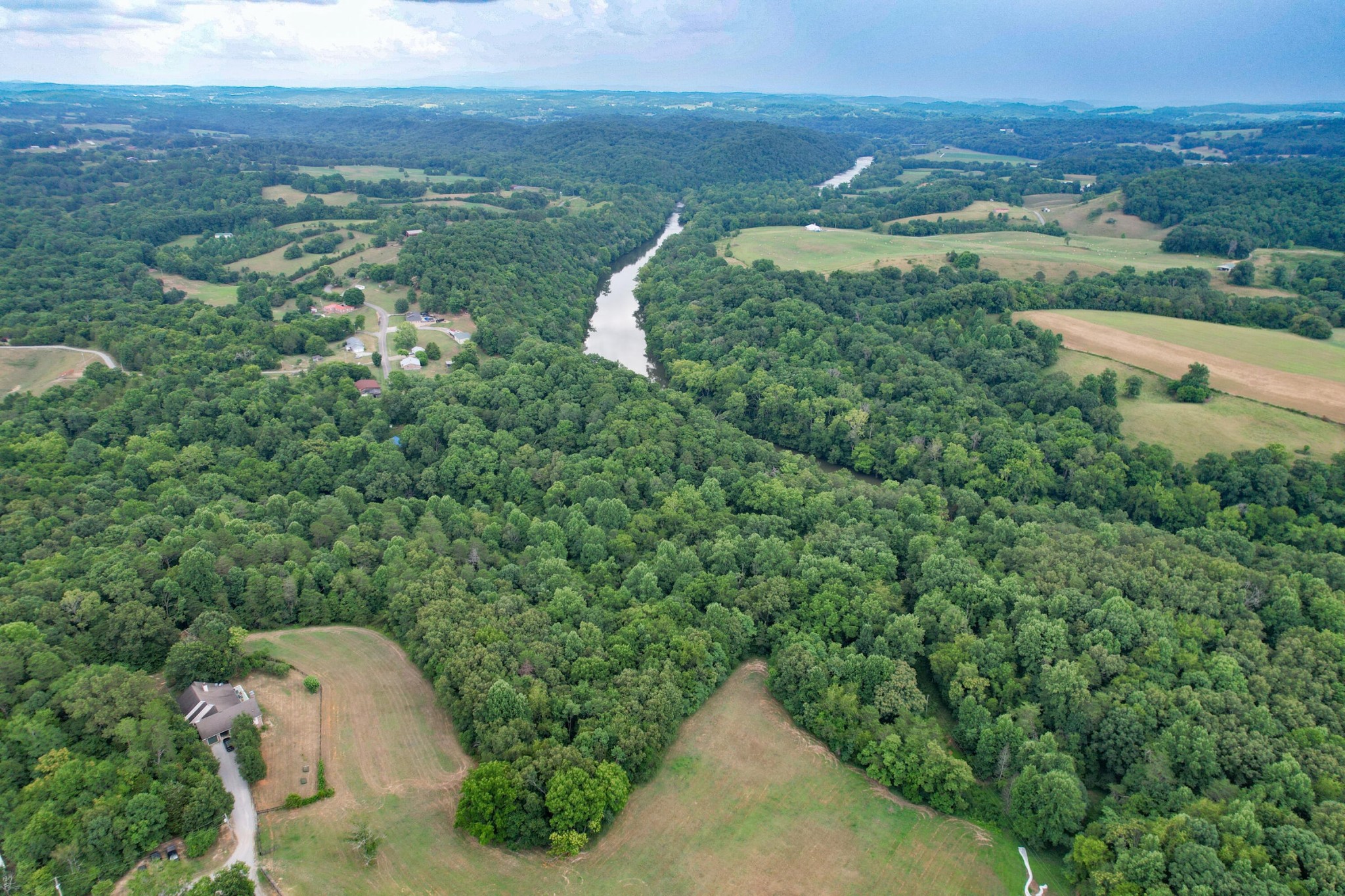 1 Pates Hill Road Mosheim, TN 37818 - Photo 13 of 22 an aerial view of a house with a yard and lake view