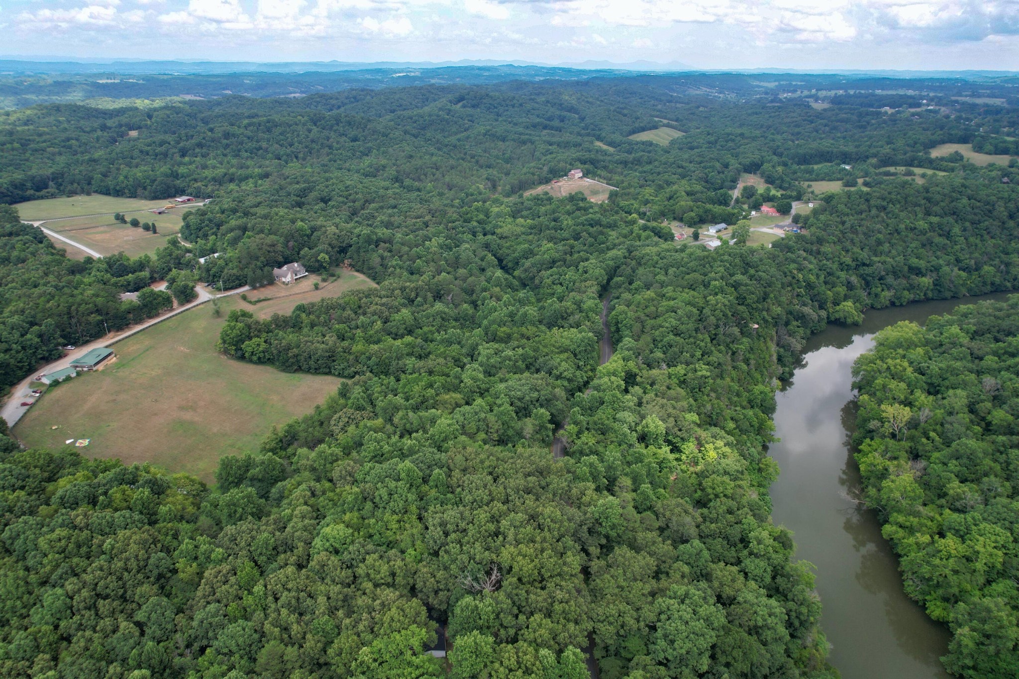 1 Pates Hill Road Mosheim, TN 37818 - Photo 17 of 22 an aerial view of residential houses with outdoor space and trees