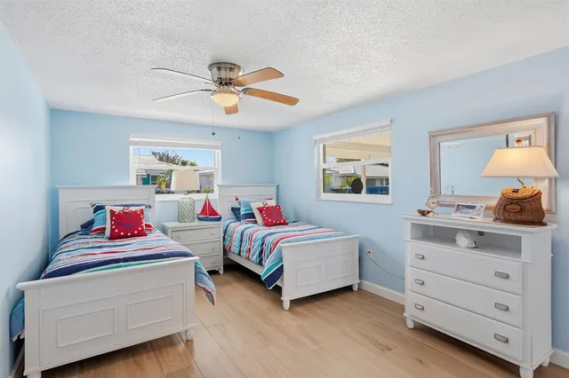 a bedroom with furniture and a dresser