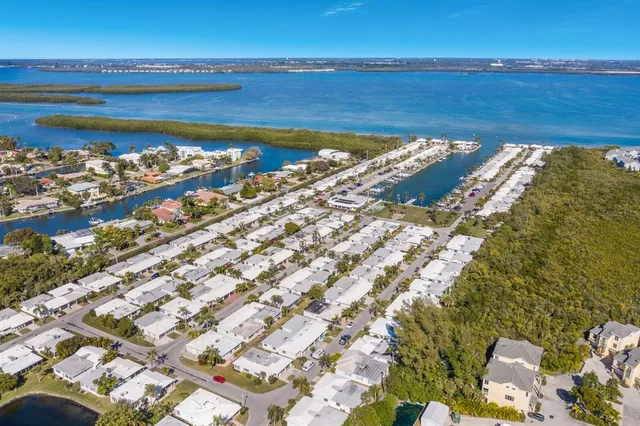 a front view of a house with an outdoor seating