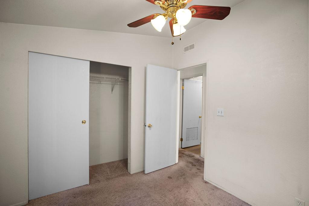 1281 Pleasant Valley Road, Unit 44 Diamond Springs, CA 95619 - Photo 16 of 29 an empty room with a empty space and a ceiling fan