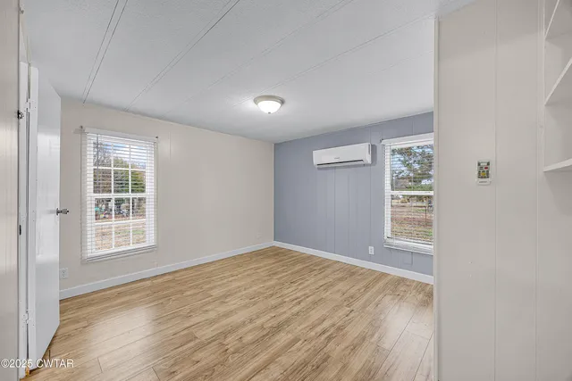 an empty room with windows