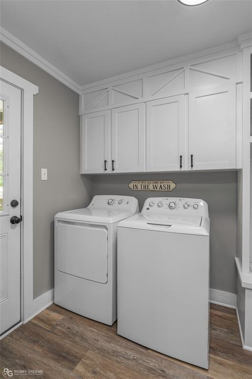 1426 Caney Lake Road Minden, LA 71055 - Photo 22 of 36 Laundry area featuring wood-finish flooring, white cabinetry with black hardware, and an exterior door with window panes