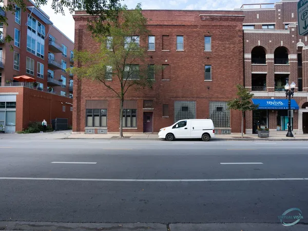 a car parked in front of a building