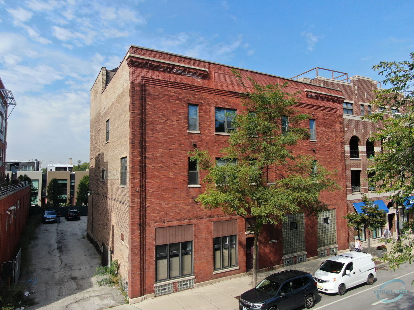 4848 North Clark Street Chicago, IL 60640 - Photo 2 of 14 a front view of a building with trees