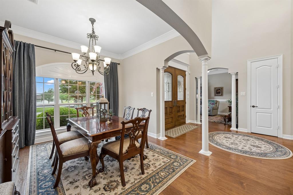 2930 Falcon Way Midlothian, TX 76065 - Photo 6 of 40 a view of a dining room with furniture window and wooden floor