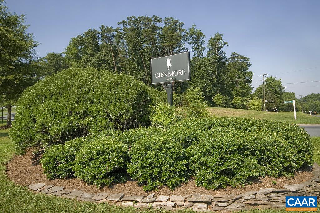3351 Darby Road Keswick, VA 22947 - Photo 54 of 73 a sign that is sitting in the grass next to a road