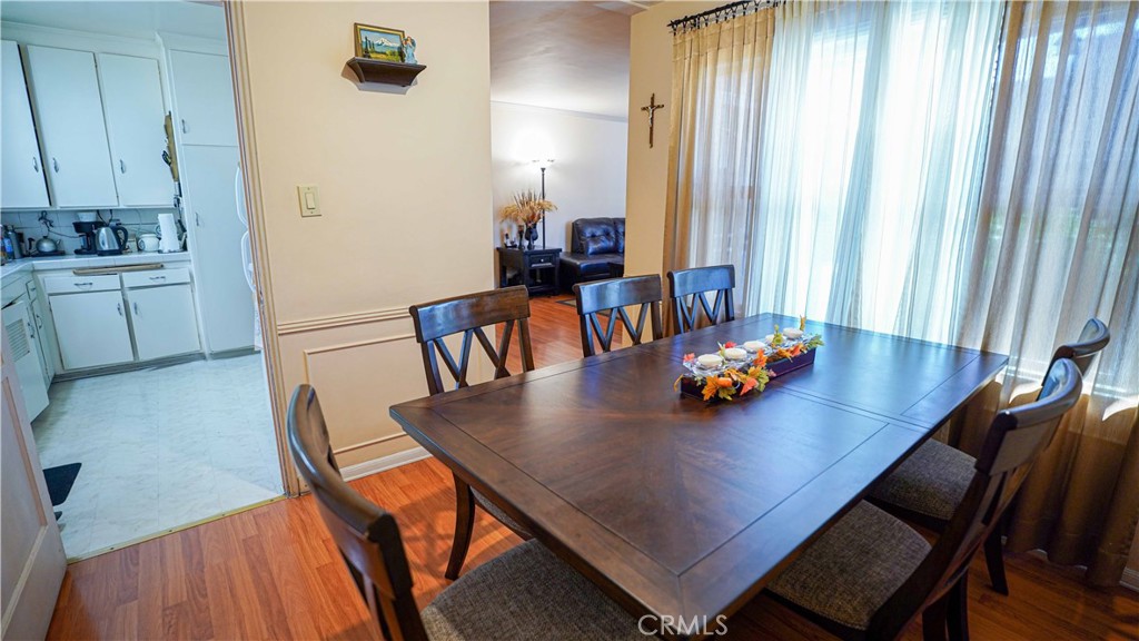 120 Lukens Place Glendale, CA 91206 - Photo 8 of 10 a dining room with furniture and wooden floor