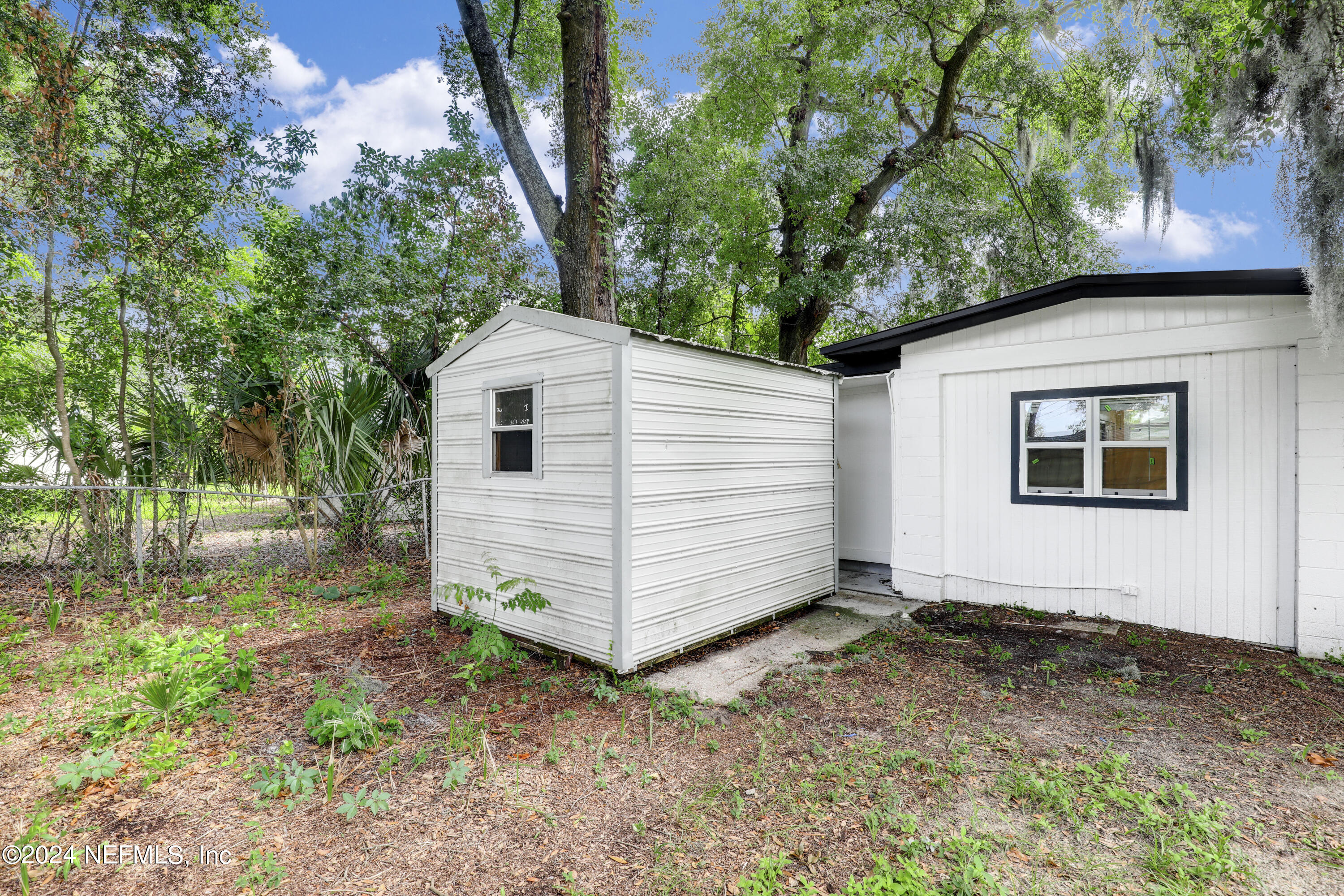 150 Sapelo Road Jacksonville, FL 32216 - Photo 27 of 28 28 Backyard - Shed