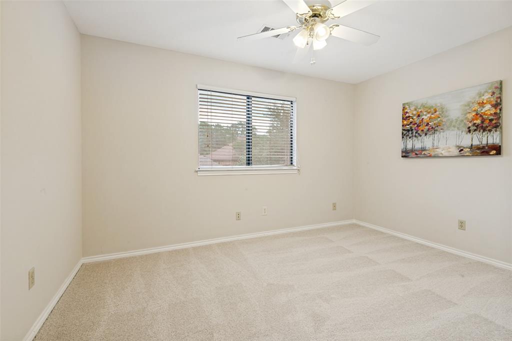2926 Roaring Springs Road Grapevine, TX 76051 - Photo 15 of 30 Upstairs bedroom with walk in closet
