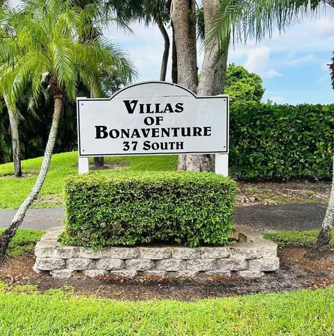 a sign on the side of a road