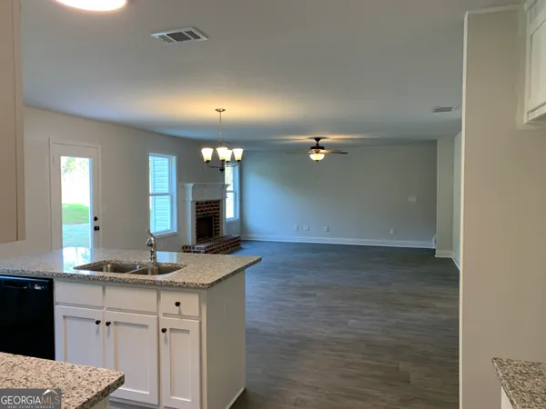 a view of a room with racks on the wall