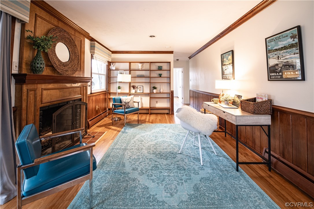 10201 Glendye Road Richmond, VA 23235 - Photo 20 of 50 a living room with furniture a fireplace and a large window
