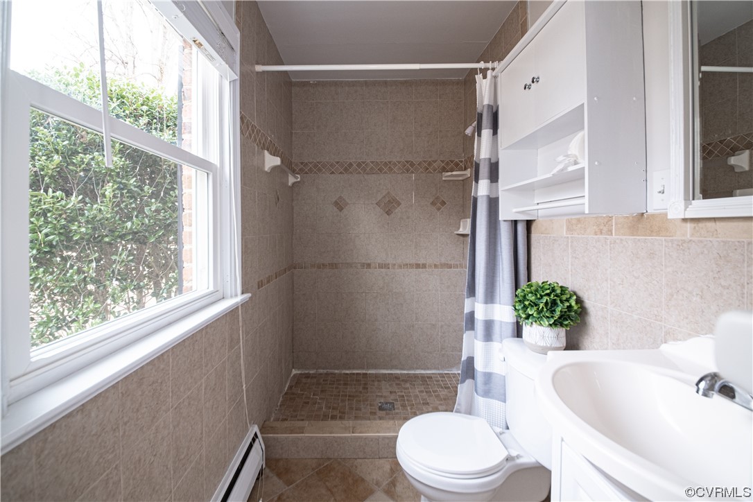 10201 Glendye Road Richmond, VA 23235 - Photo 38 of 50 a bathroom with a sink toilet and shower