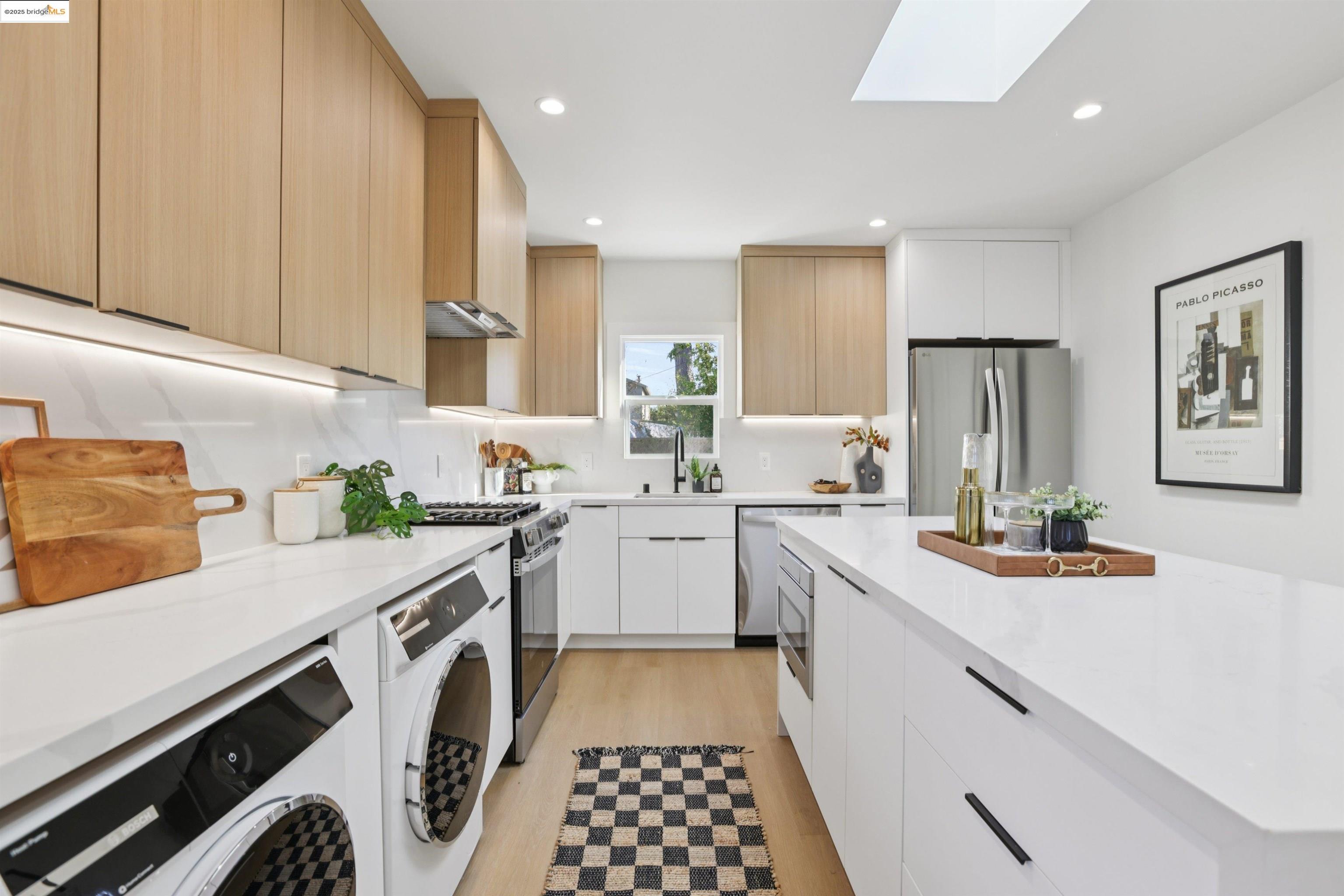 1612 Carleton Street Berkeley, CA 94703 - Photo 13 of 35 a kitchen with a sink stove and cabinets