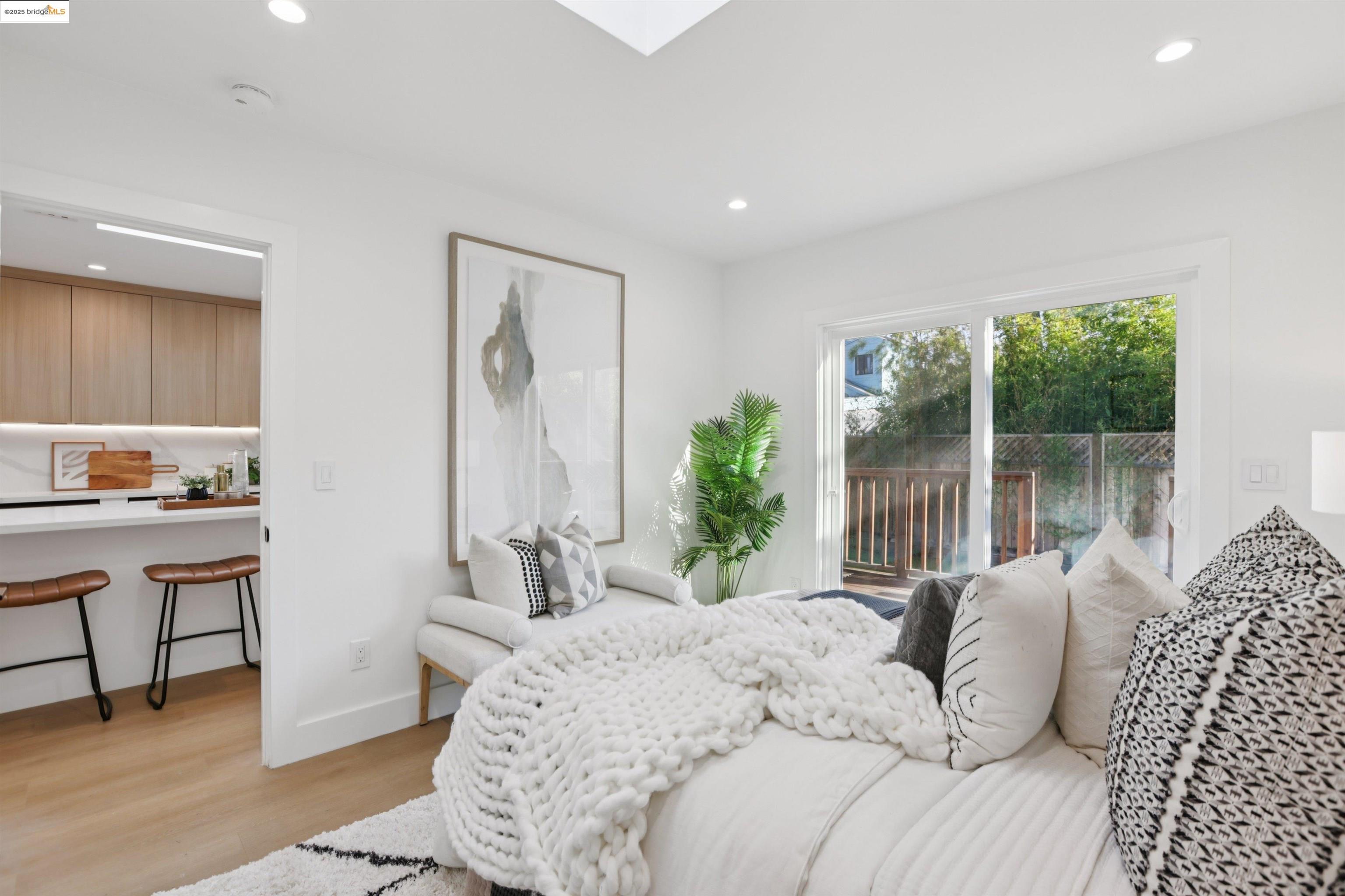 1612 Carleton Street Berkeley, CA 94703 - Photo 20 of 35 a bedroom with a bed and a window