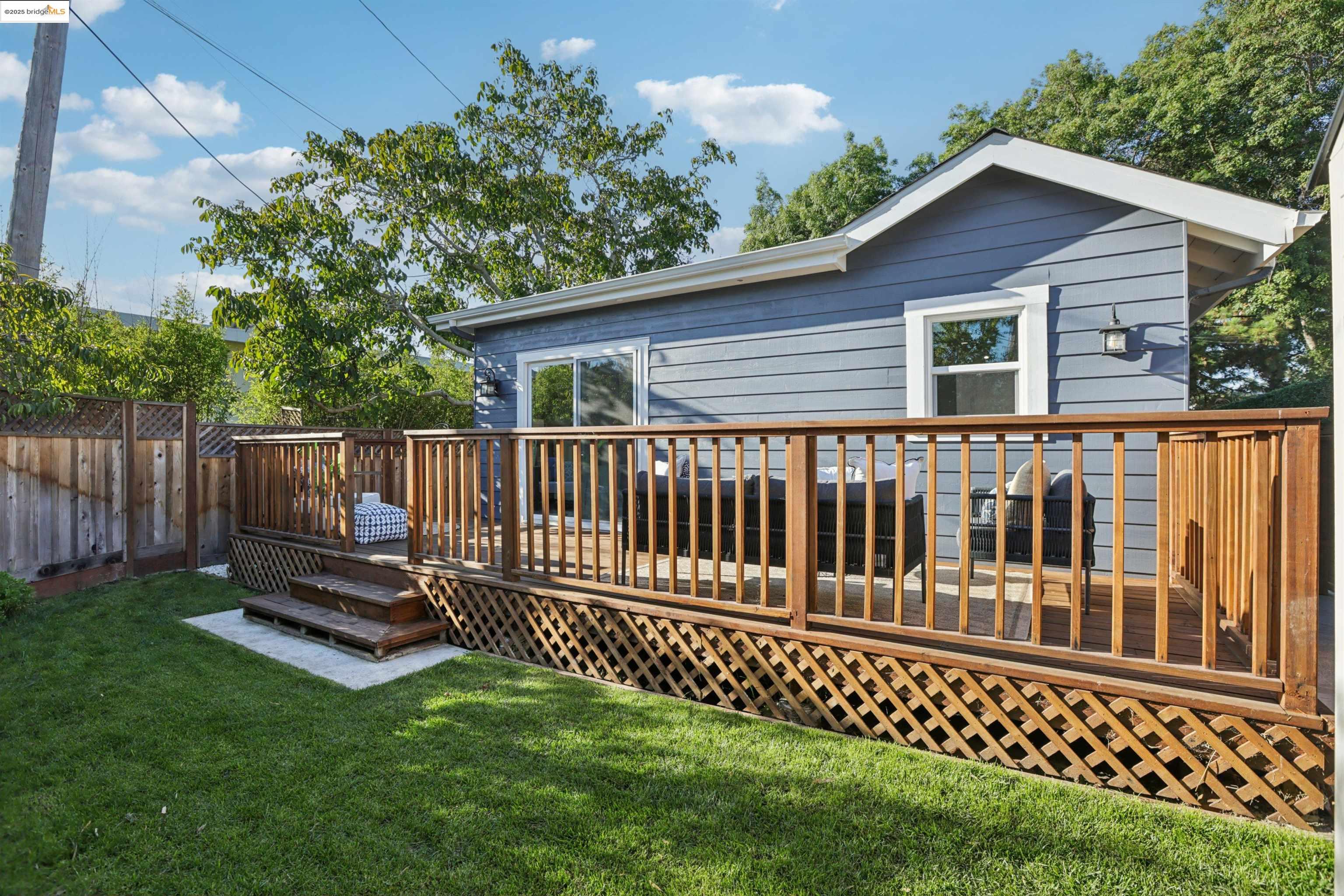 1612 Carleton Street Berkeley, CA 94703 - Photo 29 of 35 a view of a house with wooden deck