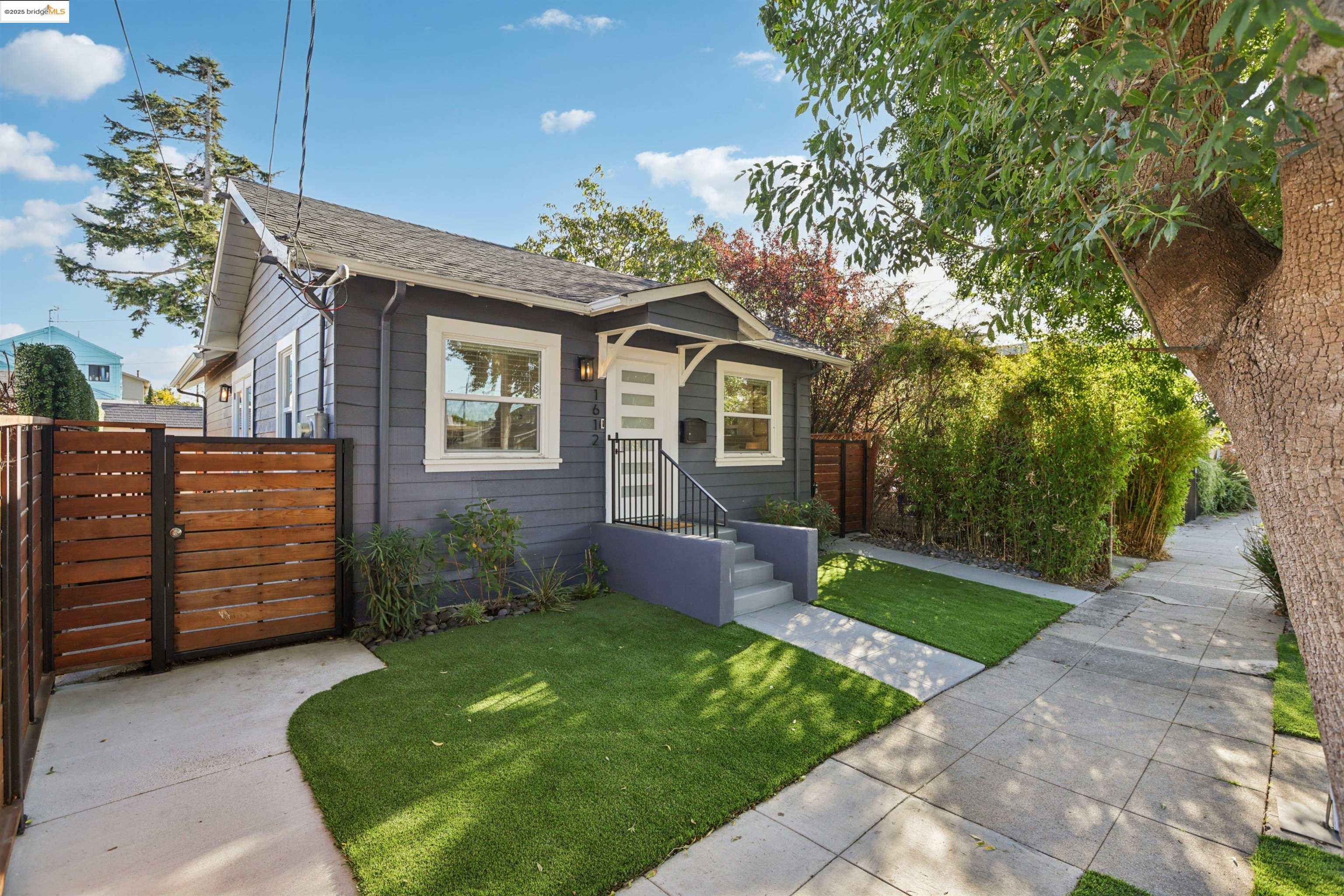 1612 Carleton Street Berkeley, CA 94703 - Photo 3 of 35 a front view of a house with garden