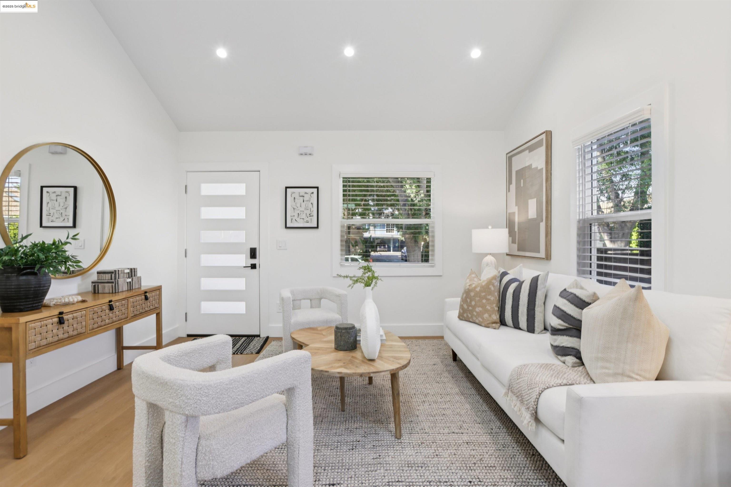 1612 Carleton Street Berkeley, CA 94703 - Photo 6 of 35 a living room with furniture and a large window