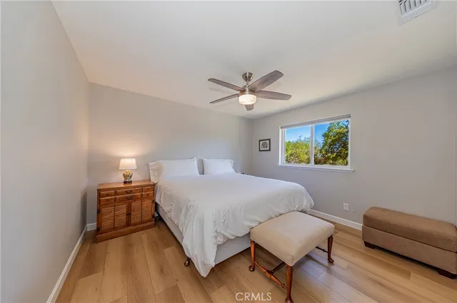 a spacious bathroom with a double vanity sink mirror and double