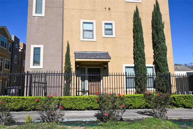 a house view with a garden space