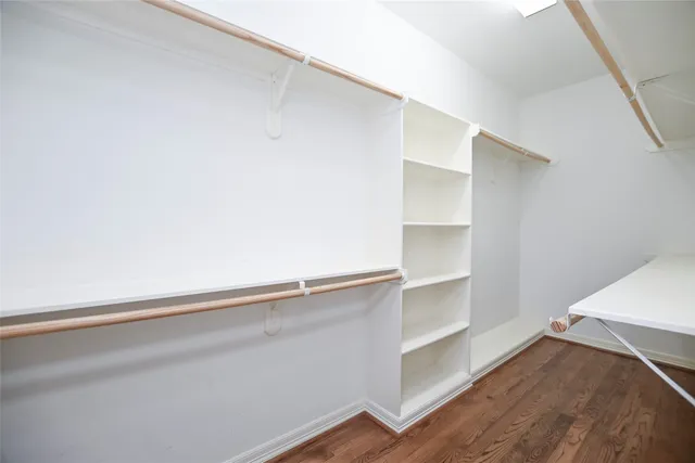 a view of an empty walk in closet