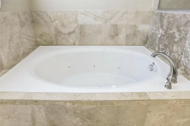 a bathroom with a bathtub