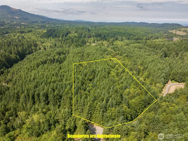 a view of a yard with an outdoor seating