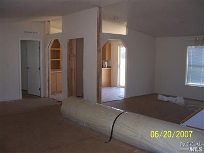 14460 A Leary Road Walnut Grove, CA 95690 - Photo 4 of 5 a living room with a bed and a window
