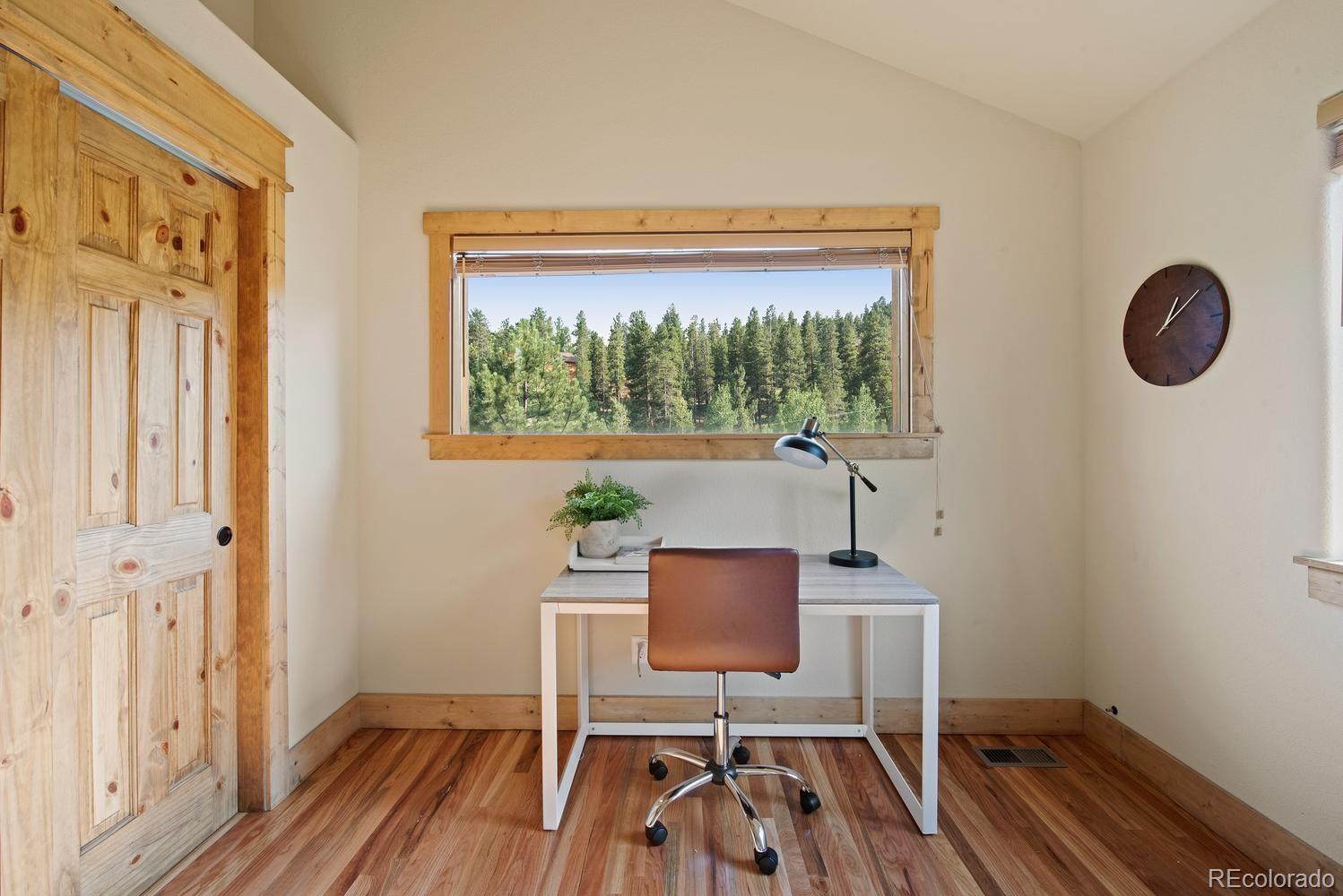 1328 Clark Road Bailey, CO 80421 - Photo 31 of 37 a workspace with furniture and a window