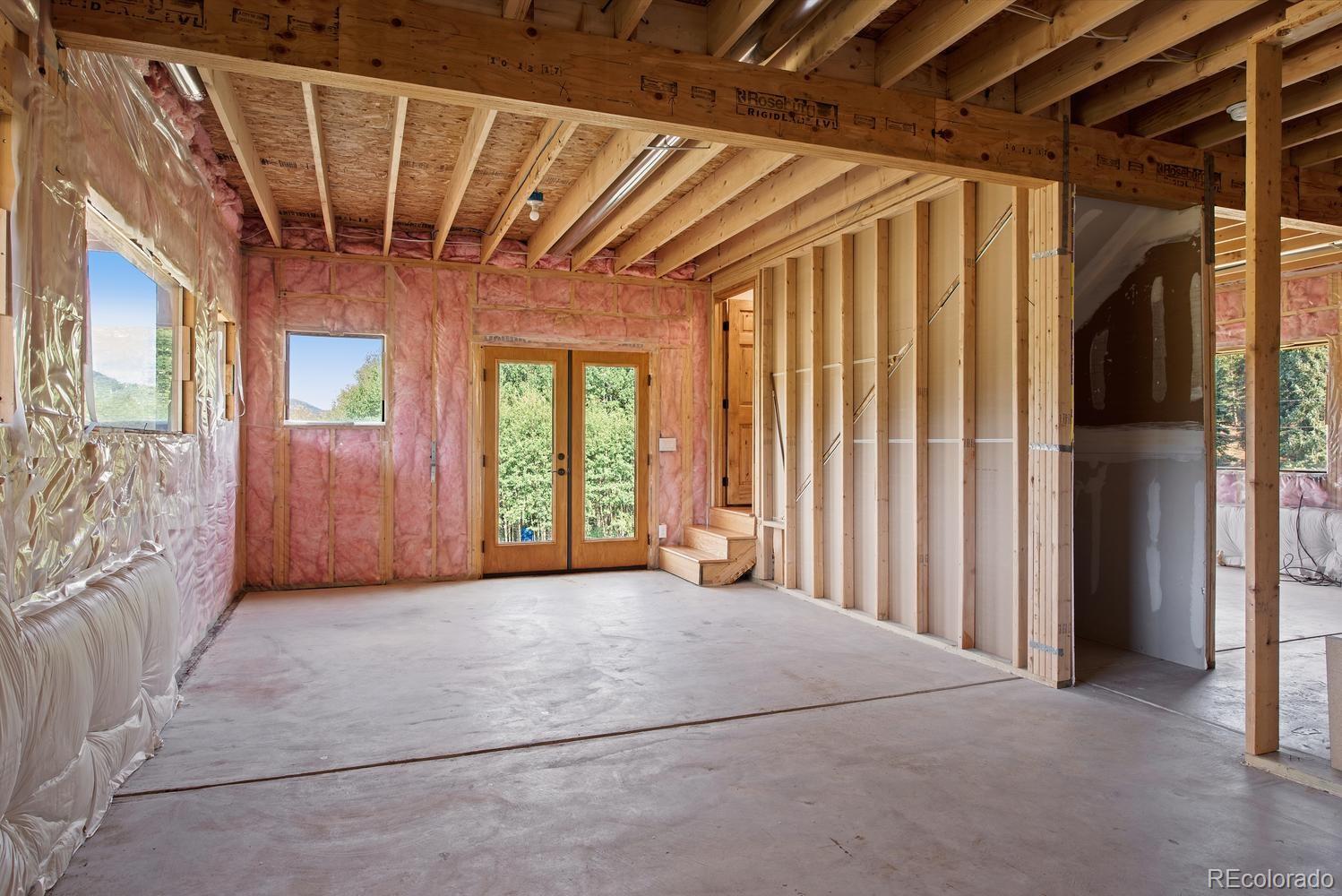 1328 Clark Road Bailey, CO 80421 - Photo 33 of 37 a view of an empty room with a window
