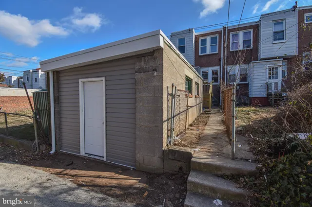 a front view of a building with balcony