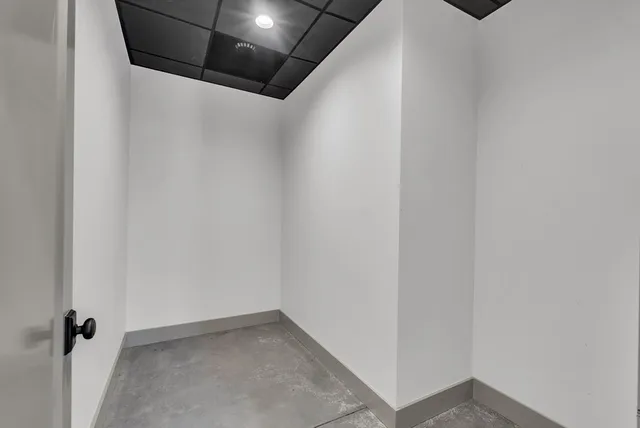 a room with furniture and screen