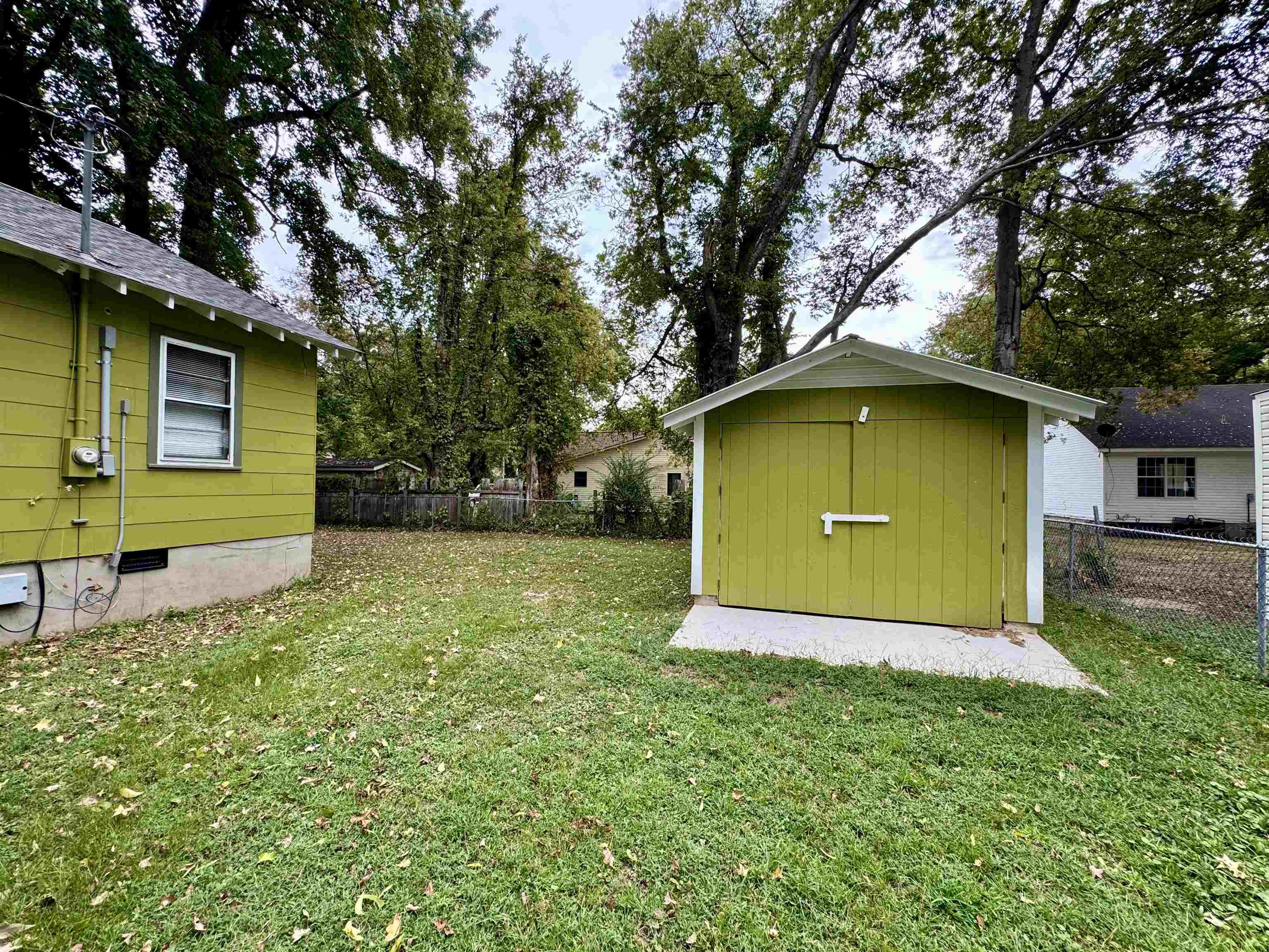 624 Fyfe Street Covington, TN 38019 - Photo 6 of 15 a view of a house with a yard