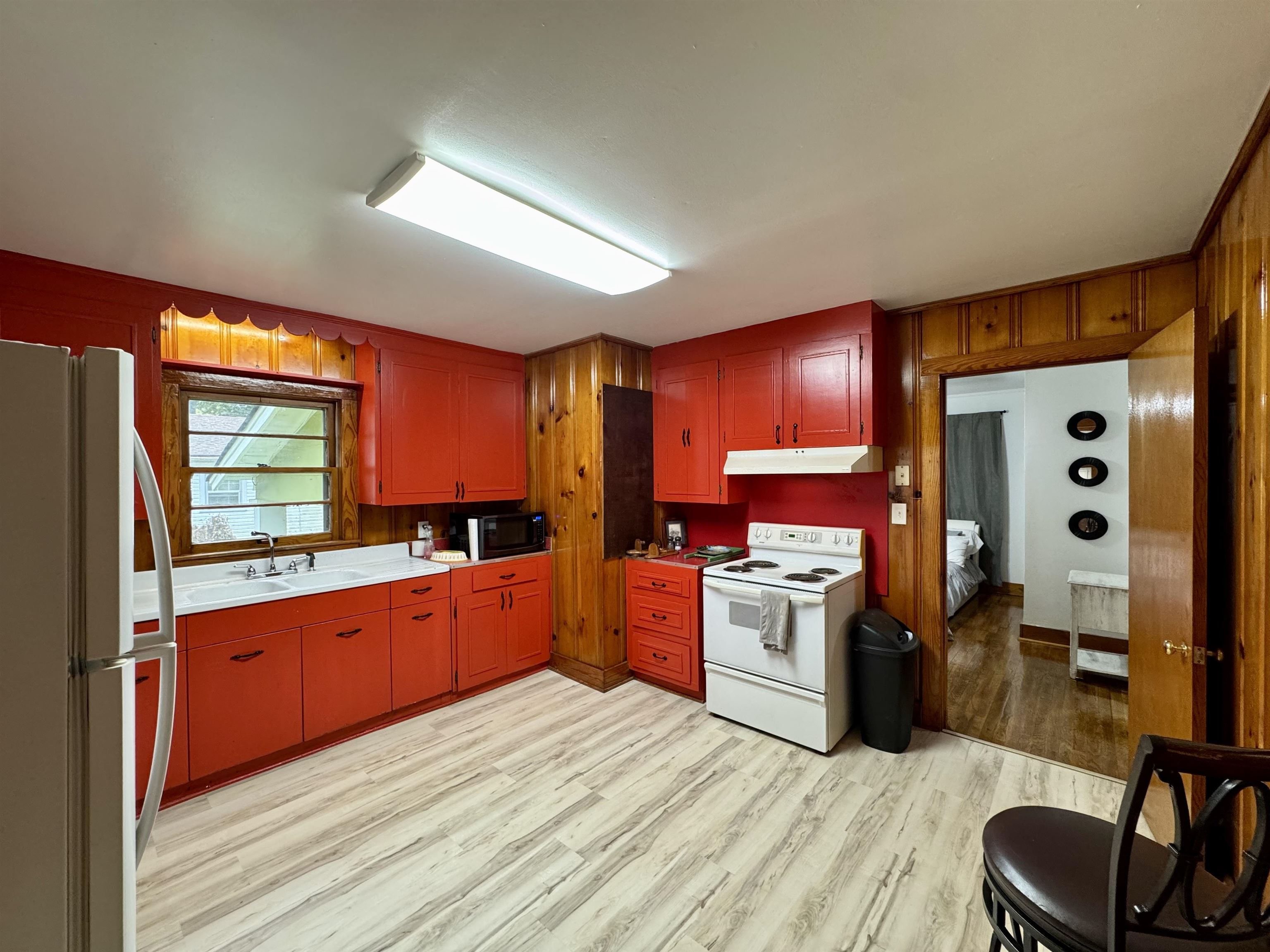 624 Fyfe Street Covington, TN 38019 - Photo 8 of 15 a kitchen with stainless steel appliances granite countertop a sink stove and refrigerator
