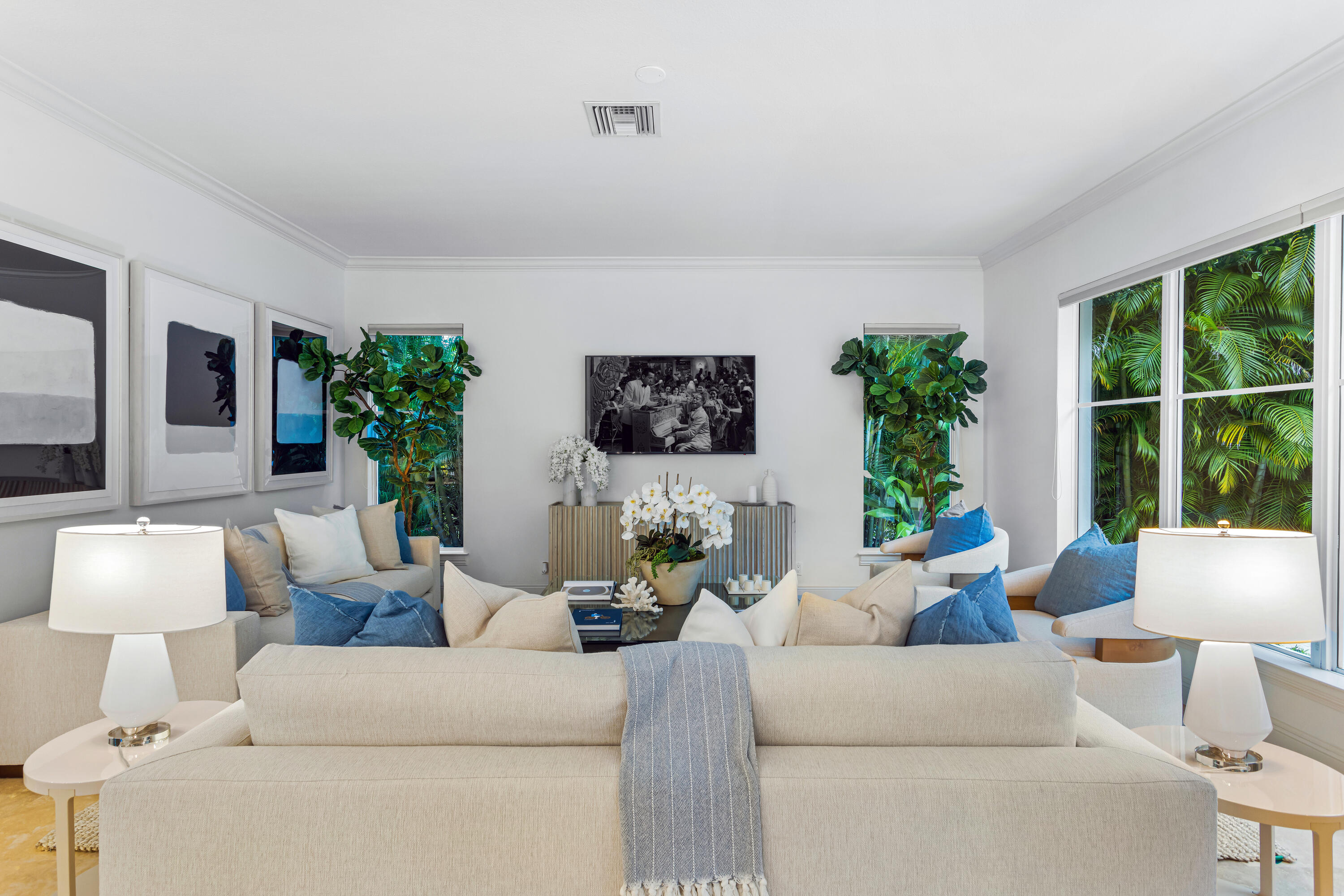 391 East Boca Raton Road Boca Raton, FL 33432 - Photo 11 of 26 a living room with furniture and a large window