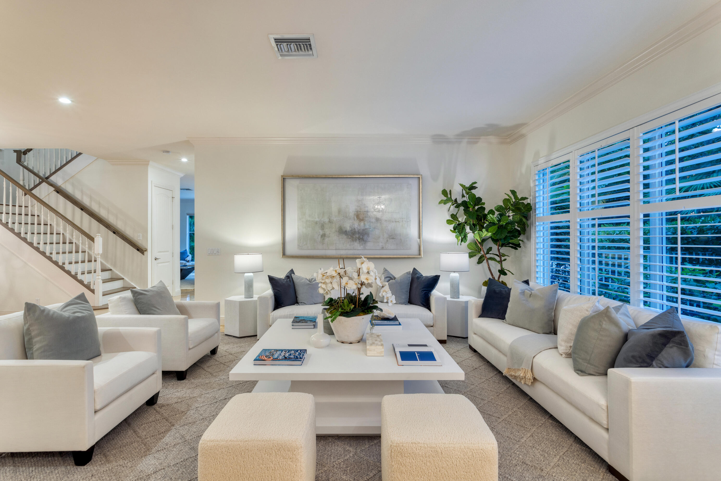 391 East Boca Raton Road Boca Raton, FL 33432 - Photo 2 of 26 a living room with furniture and a large window