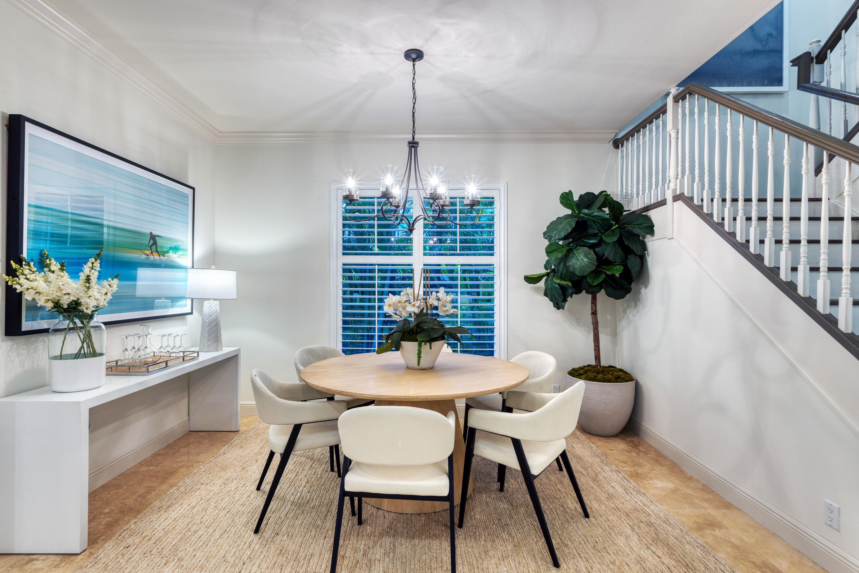 391 East Boca Raton Road Boca Raton, FL 33432 - Photo 4 of 26 a table and chairs in a room